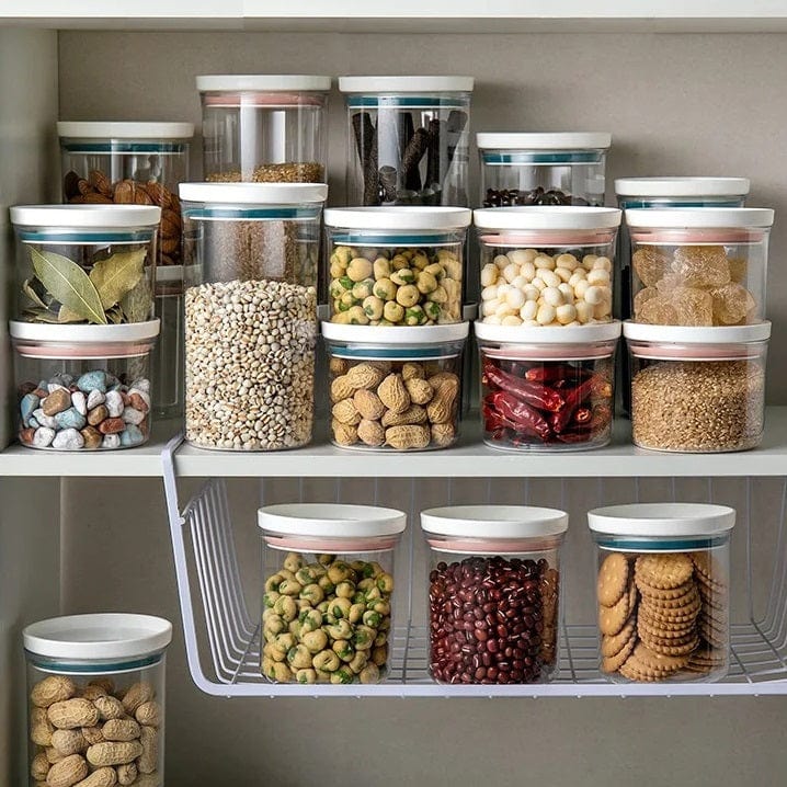 Set med 4 klara förvaringslådor med färgad tätning