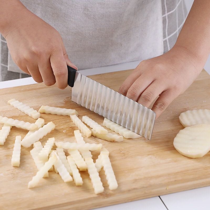 Fransk pommes frites skärmaskin med tandad kniv