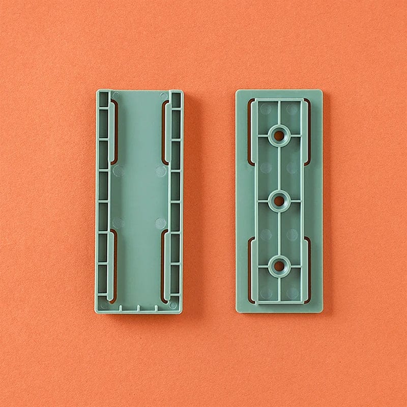 Väggfäste med klister för kök och kontor