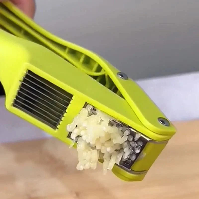 Vitlökspress 2-i-1 i rostfritt stål för att krossa och skiva vitlök, grönsakspress för hemmet.